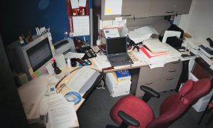 Busy office scene used for testing editorial business content.