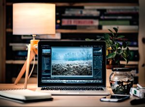 Laptop on a clean desk used as a WordPress publishing workspace.